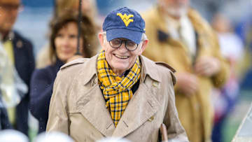 Nov 12, 2022; Morgantown, West Virginia, USA; West Virginia University president Gordon Gee smiles during halftime against the Oklahoma Sooners at Mountaineer Field at Milan Puskar Stadium. Mandatory Credit: Ben Queen-Imagn Images