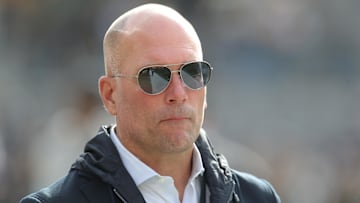 Nov 17, 2024; Pittsburgh, Pennsylvania, USA;  Baltimore Ravens general manager Eric DeCosta watches warm ups against the Pittsburgh Steelers at Acrisure Stadium. Mandatory Credit: Charles LeClaire-Imagn Images