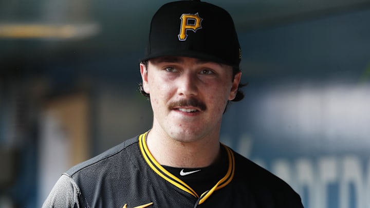 Pittsburgh Pirates starting pitcher Paul Skenes (30) looks on from the dugout against the Chicago Cubs.