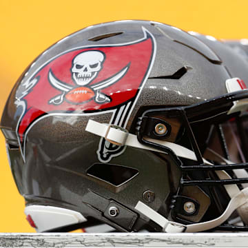 Tampa Bay Buccaneers helmets on the sidelines before the game against the Pittsburgh Steelers.