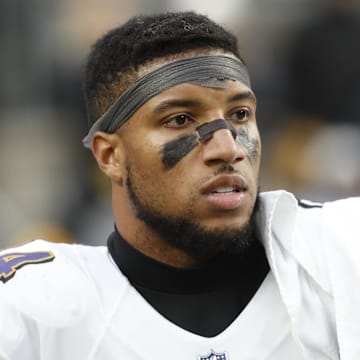 Dec 11, 2022; Pittsburgh, Pennsylvania, USA;  Baltimore Ravens cornerback Marlon Humphrey (44) looks on from the sidelines against the Pittsburgh Steelers during the fourth quarter at Acrisure Stadium. Baltimore won 16-14. Mandatory Credit: Charles LeClaire-Imagn Images