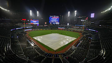 Jul 19, 2024; Atlanta, Georgia, USA; A view of the tarp on the field at Truist Park after a game between the Atlanta Braves and St. Louis Cardinals was canceled due to weather. Mandatory Credit: Brett Davis-Imagn Images

