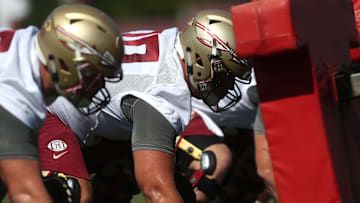 FSU's offensive line works out during their opening practice for fall camp at the Al Dunlap Training Facility Monday, Aug. 6, 2018. 

636691563153527519-B49I3032.jpg
