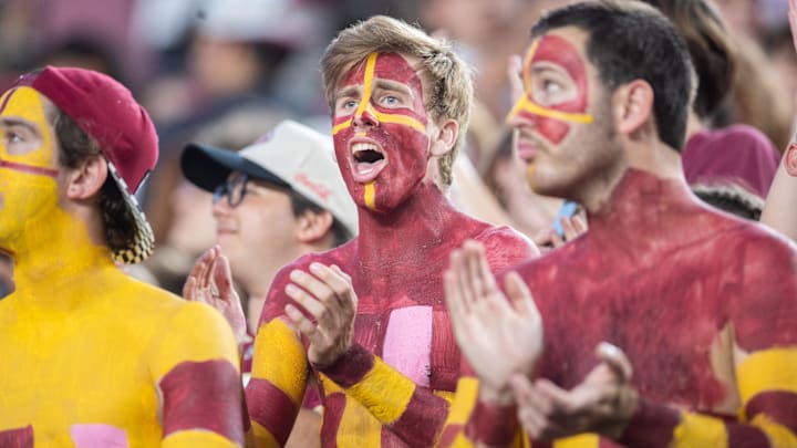Florida State Seminole fans cheer on the football team as they play the Miami Hurricanes on Saturday, Oct. 4, 2025.