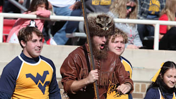 Nov 30, 2024; Lubbock, Texas, USA;  The West Virginia Mountaineers mascot celebrates after a touchdown against the Texas Tech Red Raiders in the second half at Jones AT&T Stadium and Cody Campbell Field.