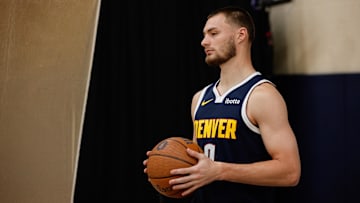 Sep 29, 2025; Denver, CO, USA; Denver Nuggets player Christian Braun (0) poses for a picture during media day at Ball Arena. Mandatory Credit: Isaiah J. Downing-Imagn Images
