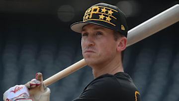 Sep 2, 2025; Pittsburgh, Pennsylvania, USA;  Pittsburgh Pirates shortstop Cam Devanney (34) at the batting cage before the game against the Los Angeles Dodgers at PNC Park. Mandatory Credit: Charles LeClaire-Imagn Images