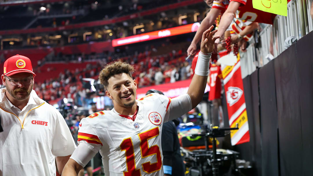 Kansas City Chiefs quarterback Patrick Mahomes celebrates with fans after a victory over the Atlanta Falcons at Mercedes-Benz Stadium. 