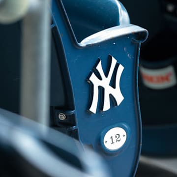 Jul 12, 2020; Bronx, New York, United States; A view of the New York Yankees logo and seat number of an empty seat during a simulated game during summer camp workouts at Yankee Stadium. Mandatory Credit: Vincent Carchietta-Imagn Images