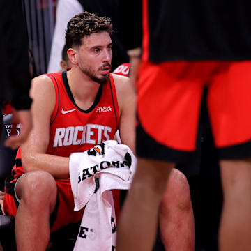 Oct 27, 2025; Houston, Texas, USA; Houston Rockets center Alperen Sengun (28) sits on the bench during a timeout against the Brooklyn Nets during the second quarter at Toyota Center. Mandatory Credit: Erik Williams-Imagn Images
