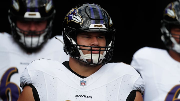 Oct 8, 2023; Pittsburgh, Pennsylvania, USA;  Baltimore Ravens center Tyler Linderbaum (64) takes the field to warm up before the game against the Pittsburgh Steelers at Acrisure Stadium. Mandatory Credit: Charles LeClaire-USA TODAY Sports