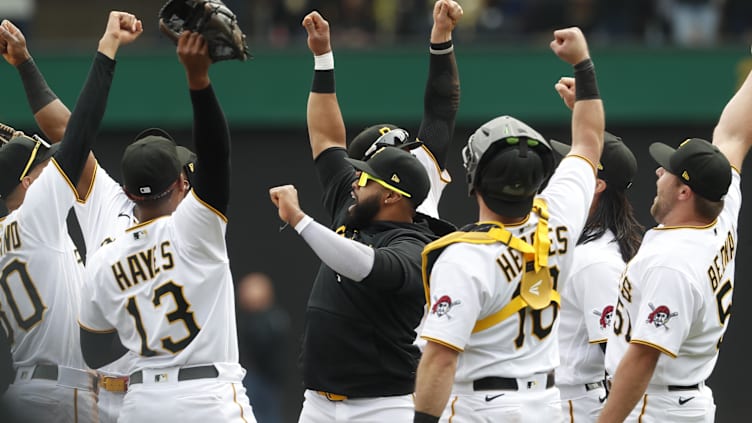 Apr 27, 2023; Pittsburgh, Pennsylvania, USA;  Pittsburgh Pirates infielders and teammates celebrate