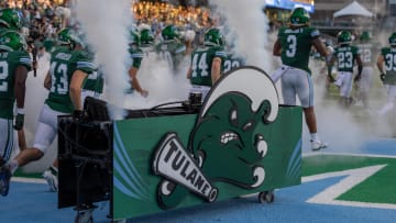 Sep 2, 2023; New Orleans, Louisiana, USA;  Tulane Green Wave run out the tunnel to start the game against the South Alabama Jaguars during the first half at Yulman Stadium. Mandatory Credit: 