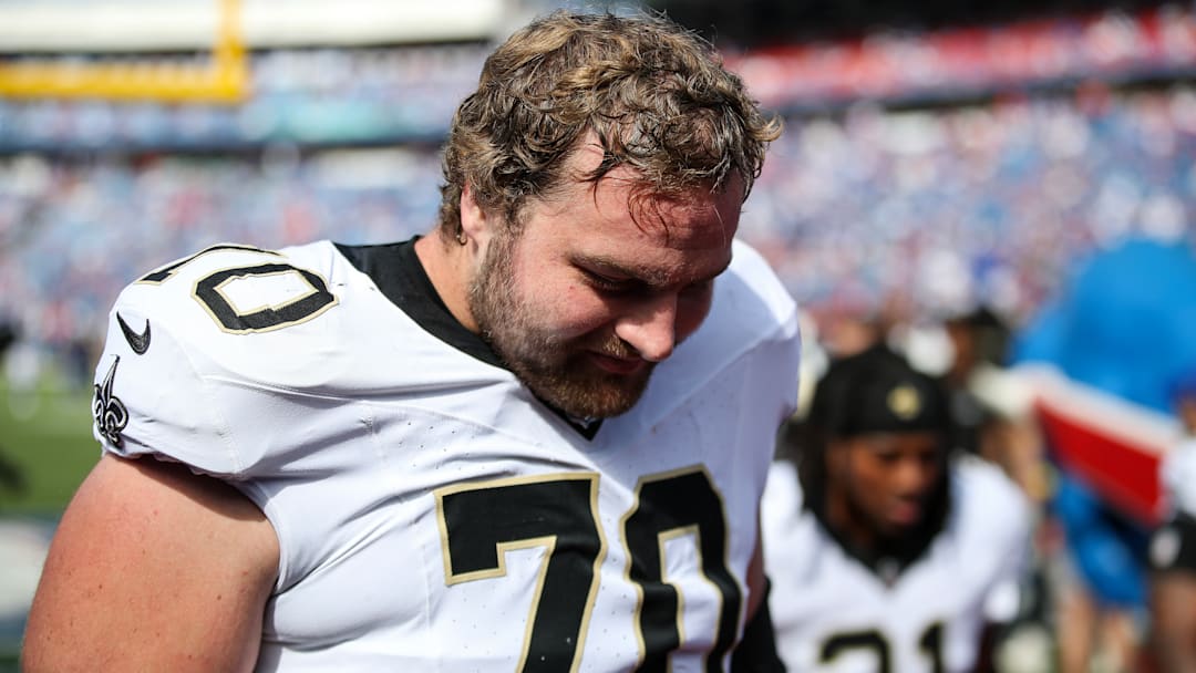 New Orleans Saints LG Trevor Penning (70) walks off the field after losing to the Buffalo Bills on Sep. 28, 2025.