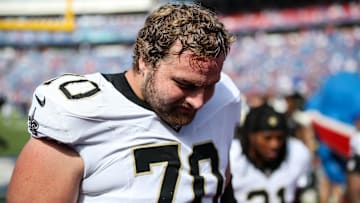 New Orleans Saints LG Trevor Penning (70) walks off the field after losing to the Buffalo Bills on Sep. 28, 2025.