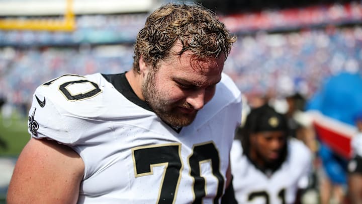 New Orleans Saints LG Trevor Penning (70) walks off the field after losing to the Buffalo Bills on Sep. 28, 2025.
