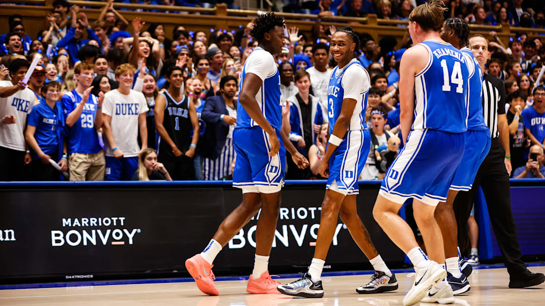 Oct 3, 2025; Durham, NC, USA; Duke Blue Devils center Patrick Ngongba II (21) and guard Isaiah Evans (3) celebrate during the Countdown to Craziness at the Cameron Indoor Stadium.