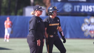 May 9, 2024; Auburn, AL, USA;  Missouri Tigers head coach Larissa Anderson talks with infielder Maddie Gallagher (1) during the game against the Florida Gators in the SEC Softball Championship game at Jane B. Moore Field. Mandatory Credit: John Reed-USA TODAY Sports