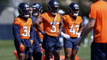 May 23, 2024; Englewood, CO, USA; Denver Broncos running back Audric Estime (37) and running back Tyler Badie (36) and running back Blake Watson (43) during organized team activities at Centura Health Training Center. Mandatory Credit: Isaiah J. Downing-USA TODAY Sports