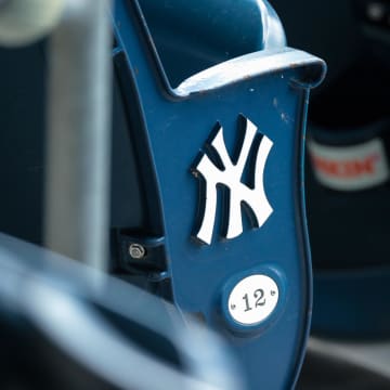 Jul 12, 2020; Bronx, New York, United States; A view of the  New York Yankees logo and seat number of an empty seat during a simulated game during summer camp workouts at Yankee Stadium. Mandatory Credit: Vincent Carchietta-USA TODAY Sports