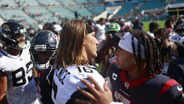Jacksonville Jaguars quarterback Trevor Lawrence (16) and Houston Texans quarterback C.J. Stroud (7) talk after the game of an NFL football matchup Sunday, Sept. 24, 2023 at EverBank Stadium in Jacksonville, Fla. The Houston Texans defeated the Jacksonville Jaguars 37-17. [Corey Perrine/Florida Times-Union]