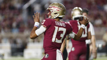 Nov 18, 2023; Tallahassee, Florida, USA; Florida State Seminoles quarterback Jordan Travis (13) throws a pass during the warm ups against the North Alabama Lions at Doak S. Campbell Stadium. Mandatory Credit: Morgan Tencza-USA TODAY Sports