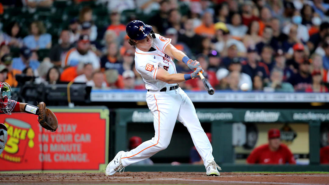 Jul 2, 2022; Houston, Texas, USA; Houston Astros center fielder Jake Myers (6) hits an RBI single to left field against the Los Angeles Angels during the first inning at Minute Maid Park. 
