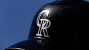 A detail view of a Colorado Rockies batting helmet in the seventh inning against the Chicago White Sox at Coors Field. 