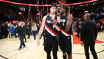 Nov 5, 2025; Portland, Oregon, USA;  Portland Trail Blazers forward Deni Avdija (8) and forward Jerami Grant (9) react after the game against Oklahoma City Thunder at the Moda Center. Mandatory Credit: Jaime Valdez-Imagn Images

