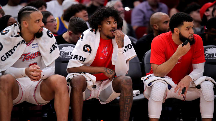 Mar 23, 2024; Houston, Texas, USA; (from L-to-R) Houston Rockets forward Dillon Brooks (9), Houston Rockets guard Jalen Green (4) and Houston Rockets guard Fred VanVleet (5) sit on the bench against the Utah Jazz during the second quarter at Toyota Center. Mandatory Credit: Erik Williams-USA TODAY Sports