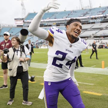 Nov 10, 2024; Jacksonville, Florida, USA; Minnesota Vikings safety Camryn Bynum (24) celebrates the win over the Jacksonville Jaguars at EverBank Stadium. Mandatory Credit: Morgan Tencza-Imagn Images