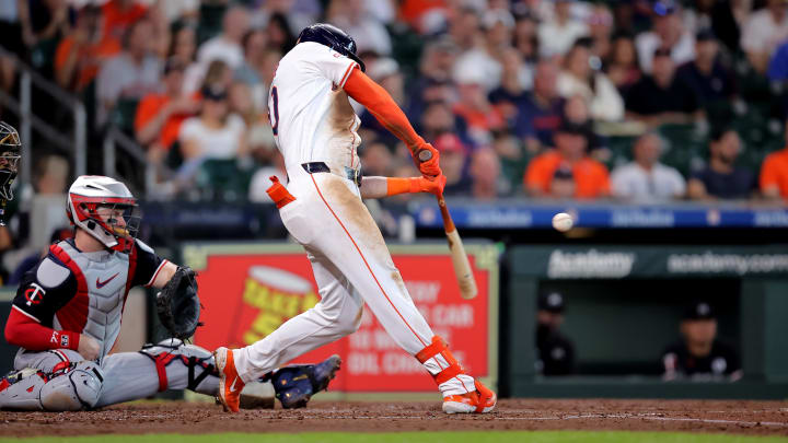 Jun 2, 2024; Houston, Texas, USA; Houston Astros designated hitter Kyle Tucker (30) hits a single against the Minnesota Twins during the third inning at Minute Maid Park. 