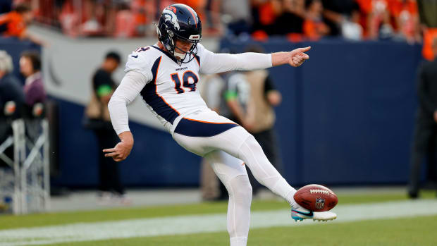 Denver Broncos punter Riley Dixon (19) warms up before the game against the Los Angeles Rams at Empower Field at Mile High.