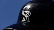 A detail view of a Colorado Rockies batting helmet in the seventh inning against the Chicago White Sox at Coors Field. 