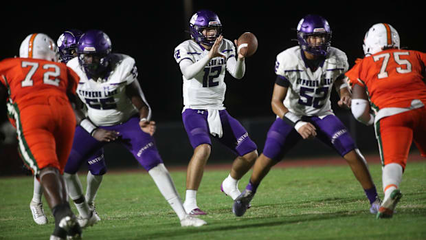 Cypress Lake QB Joey Dube-Garrett threw for six touchdowns in a big victory over Estero on Sept. 27, 2024.