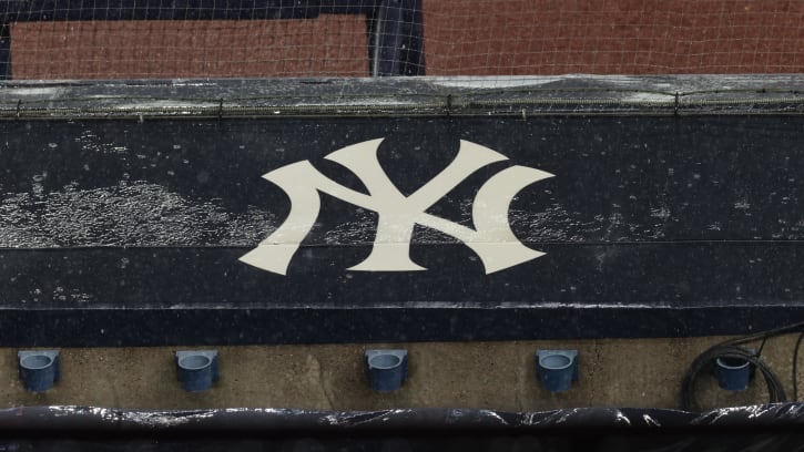 Aug 17, 2020; Bronx, New York, USA; A general view of rain falling on the  New York Yankees logo on