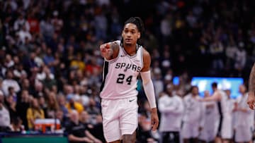 Nov 28, 2025; Denver, Colorado, USA; San Antonio Spurs guard Devin Vassell (24) gestures in the fourth quarter against the Denver Nuggets at Ball Arena. Mandatory Credit: Isaiah J. Downing-Imagn Images