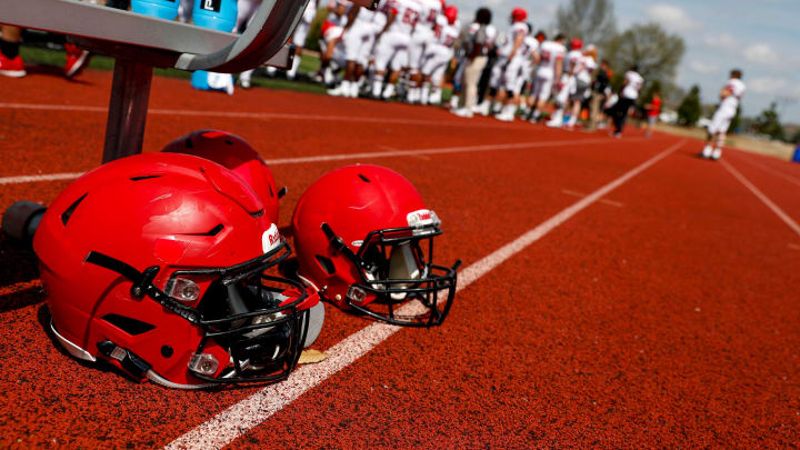 Practice helmets sit on the track next to a bench during the Austin Peay spring football game at Fortera Stadium in Clarksville, Tenn., on Saturday, April 6, 2019. 

Hpt Austin Peay Spring Game 08