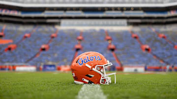 Oct 5, 2024; Gainesville, Florida, USA; A Florida Gators helmet sits on the field before a game against the UCF Knights at Ben Hill Griffin Stadium. Mandatory Credit: Matt Pendleton-Imagn Images
