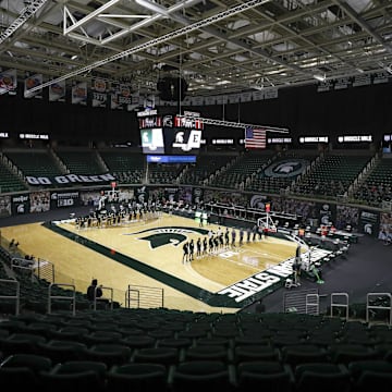 Nov 25, 2020; East Lansing, Michigan, USA; Michigan State Spartans and Eastern Michigan Eagles stand on the court before a game at Jack Breslin Student Events Center. Mandatory Credit: Raj Mehta-Imagn Images