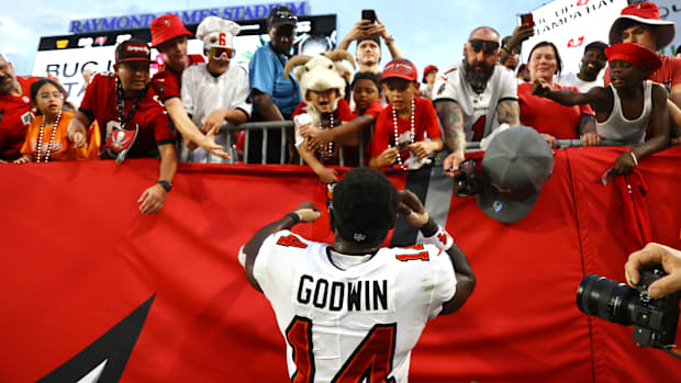 Tampa Bay Buccaneers wide receiver Chris Godwin greets the fans after they beat the Washington Commanders. 