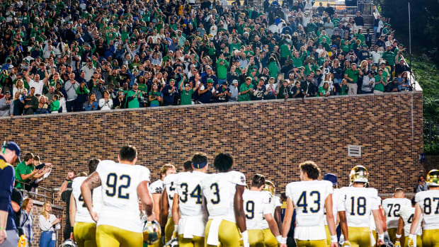 Notre Dame walks off the field after a comeback victory to beat Duke in 2023.