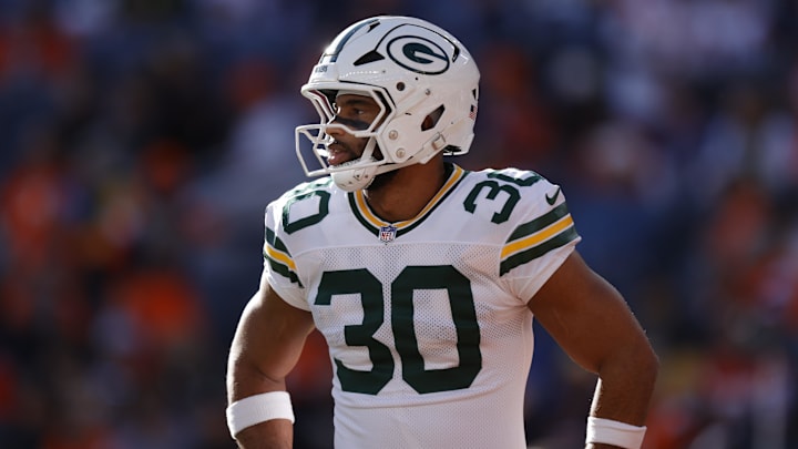 Dec 14, 2025; Denver, Colorado, USA; Green Bay Packers running back Chris Brooks (30) warms up before a game against the Denver Broncos at Empower Field at Mile High. Mandatory Credit: Isaiah J. Downing-Imagn Images