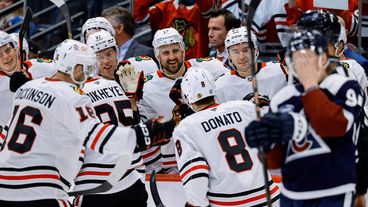 Oct 28, 2024; Denver, Colorado, USA; Chicago Blackhawks left wing Nick Foligno (17) and left wing Taylor Hall (71) and center Philipp Kurashev (23) celebrate with right wing Ilya Mikheyev (95) and center Ryan Donato (8) and center Jason Dickinson (16) after a goal against the Colorado Avalanche in the third period at Ball Arena. Mandatory Credit: Isaiah J. Downing-Imagn Images