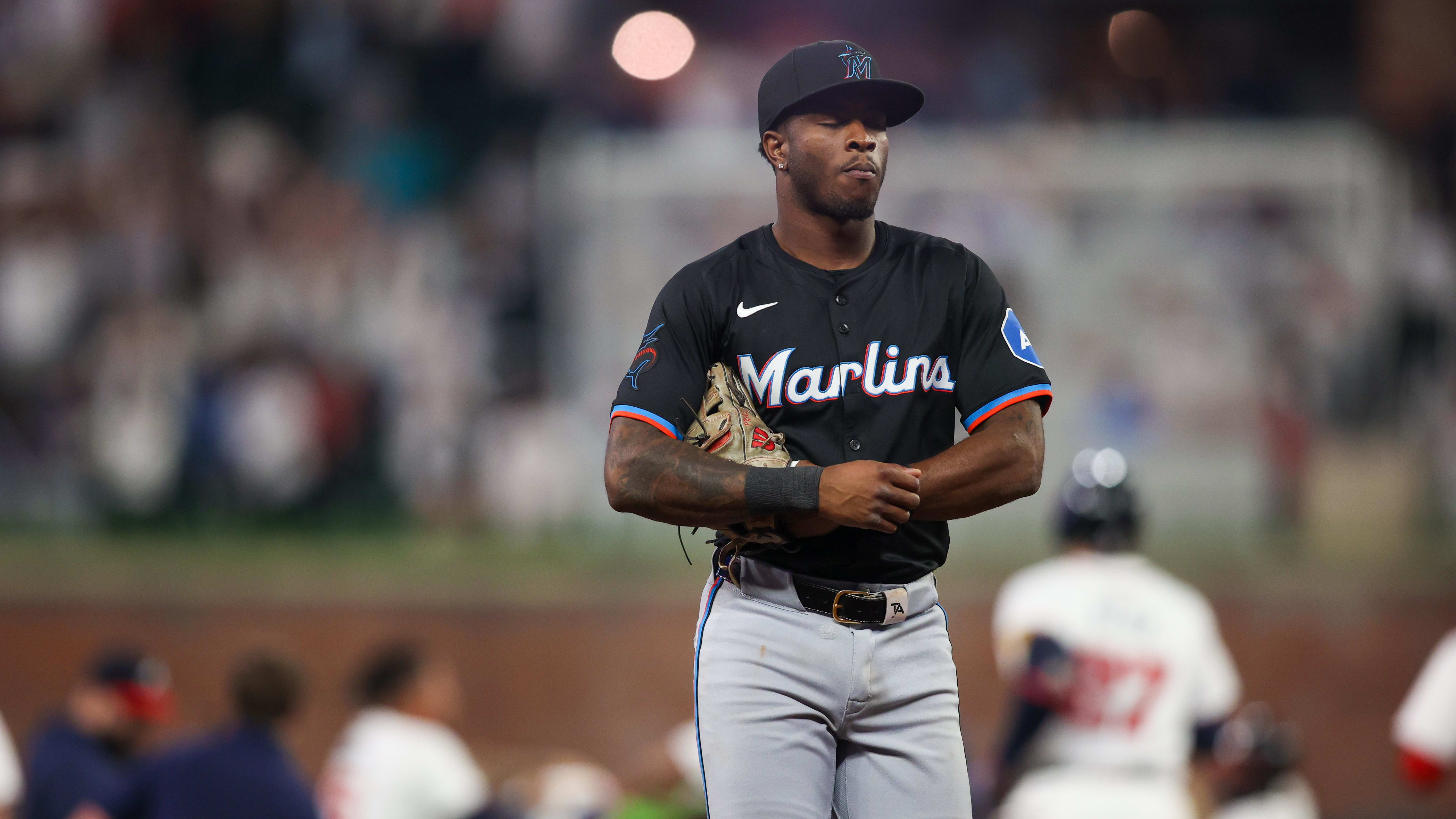 Apr 24, 2024; Atlanta, Georgia, USA; Miami Marlins shortstop Tim Anderson (7) walks off the field.