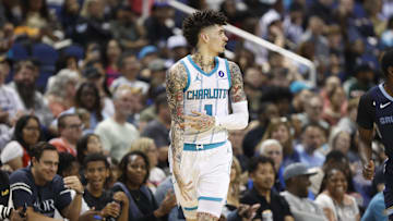 Oct 15, 2025; Greensboro, North Carolina, USA; Charlotte Hornets guard LaMelo Ball (1) celebrates after making a three-poiunt basket during the second half against the Memphis Grizzlies at First Horizon Coliseum. Mandatory Credit: Brian Westerholt-Imagn Images