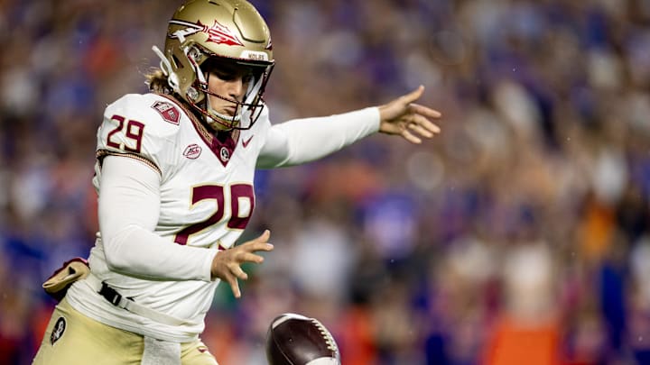 Florida State Seminoles punter Alex Mastromanno (29) punts the ball during the first half against the Florida Gators at Steve Spurrier Field at Ben Hill Griffin Stadium in Gainesville, FL on Saturday, November 25, 2023. [Matt Pendleton/Gainesville Sun]