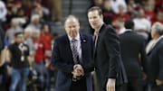Feb 15, 2020; Lincoln, Nebraska, USA; Wisconsin Badgers  head coach Greg Gard and Nebraska Cornhuskers head coach Fred Hoiberg greet each other prior to the game at Pinnacle Bank Arena. Mandatory Credit: Bruce Thorson-Imagn Images
