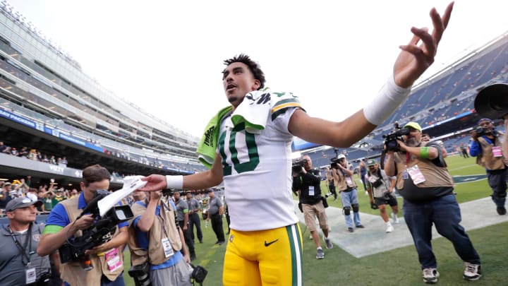 Jordan Love shows off after beating the Bears in last year's opener.  One of the worst possible openers for the Bears this year would be Green Bay.