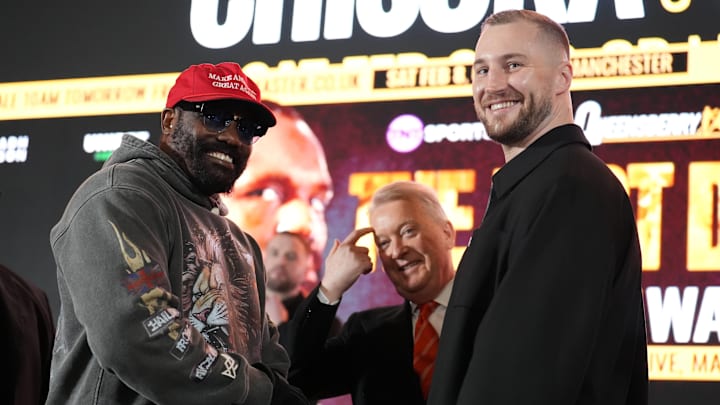 Derek Chisora (left) and Otto Wallin (right) during their staredown at the pre-fight press conference.